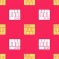 Yellow Music synthesizer icon isolated seamless pattern on red background. Electronic piano. Vector Royalty Free Stock Photo