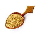 Yellow Mustard Seeds on Wooden Spoon Isolated on White Top View Royalty Free Stock Photo