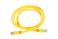 Yellow Network Cable with molded RJ45 plug isolated on white background Royalty Free Stock Photo
