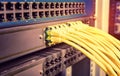 yellow network cable in switch and firewall in cloud computing data center Royalty Free Stock Photo