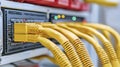 Yellow Network Cables Connected to Server Rack