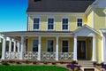 Yellow New England Style Home with Porch Royalty Free Stock Photo