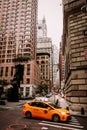 Yellow New York Cab on Lower Manhattan street Royalty Free Stock Photo