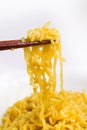 Noodles on a chopstick in white background Royalty Free Stock Photo