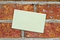 Yellow Note On brick wall Royalty Free Stock Photo