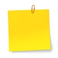 Yellow note with orange Paper clip Royalty Free Stock Photo