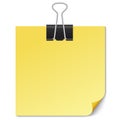 Yellow Note paper with Binder clip on white. Royalty Free Stock Photo