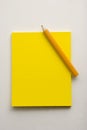 Yellow Note Paper and Pencil Royalty Free Stock Photo