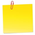 Yellow note with red paper clip