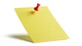 Yellow note with red pushpin isolated on white background Royalty Free Stock Photo