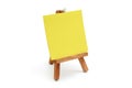 Yellow notepaper with mini easel Royalty Free Stock Photo