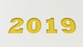 Yellow 2019 number cut in white paper