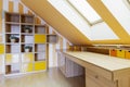 Yellow office room in an attic