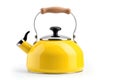 Yellow Old Tea Kettle Enlivens Any Setting - Elevate your ambiance with the allure of yesteryears. This modern yellow old tea Royalty Free Stock Photo