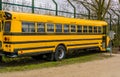 Yellow old vintage school bus, Retro vehicles, Transportation for the kids to school Royalty Free Stock Photo