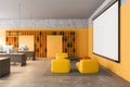 Yellow open space office with lounge area