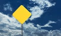 yellow orange color sign road blue sky cloud white background copy space empty blank traffic warning caution symbol street Royalty Free Stock Photo