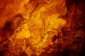 Yellow orange fiery red brown black grunge background. Cracked wall. Burnt. Fire or horror concept. Royalty Free Stock Photo