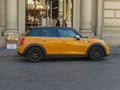 Yellow orange Mini Cooper car Royalty Free Stock Photo