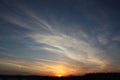 Yellow, orange and peach sunset with cirrus clouds in Trevor, Wisconsin Royalty Free Stock Photo