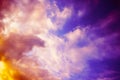 Yellow orange pink purple sunset. Beautiful evening sky with clouds. Background with space for design. Royalty Free Stock Photo