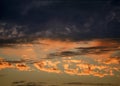 Yellow orange and red clouds at sunset Royalty Free Stock Photo