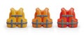 Yellow, orange, red inflatable life jackets. Personal flotation device, PFD