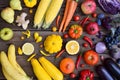 Yellow, orange, red, purple fruits and vegetables on wooden background. Healthy food. Multicolored raw food. Copy space Royalty Free Stock Photo