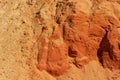 Yellow and orange sand texture of the colored sand cliffs of Rainbow Beach, Australia Royalty Free Stock Photo