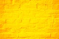 Yellow orange summer brick wall Caribbean background texture pattern Royalty Free Stock Photo