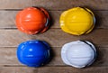 Yellow, Orange, White and Blue protective safety helmet