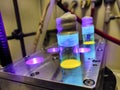 Yellow Organic photochemical rection in sealed glass vials under metal block cooling condition under blue light