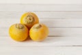 Yellow organic raw turnips on white wooden background Royalty Free Stock Photo