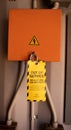 Yellow out of service tag attached on faulty damage defect of contribution power board