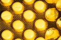 Yellow packaging of tablets is macro