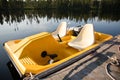 Yellow Paddle Boat In the Summer on a Lake Royalty Free Stock Photo