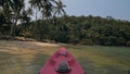 Yellow paddle on pink canoe standing on sand beach Royalty Free Stock Photo