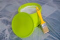 Yellow paint brush and green bucket Royalty Free Stock Photo
