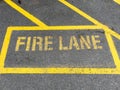 Yellow paint fire lane stencil Royalty Free Stock Photo
