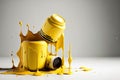 Yellow paint spills in a still life shot with a white background