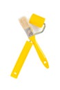 Yellow paintbrush and paintroller