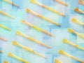 Yellow paintbrushes pattern on blue background