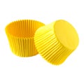 Yellow paper baking forms for muffins and cupcakes