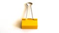 Yellow paper clip isolated on white background - image Royalty Free Stock Photo
