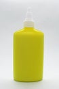 Yellow paper glue bottle Royalty Free Stock Photo