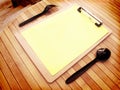 Yellow paper menu with black plastic fork and spoon juxtapose on a wooden table have space