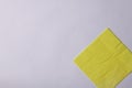 yellow paper napkin lies on a white background Royalty Free Stock Photo