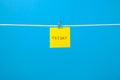Yellow paper note on clothesline with text Friday Royalty Free Stock Photo
