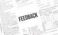 Yellow Paper Note With Words Feedback , Tax concept Royalty Free Stock Photo