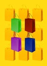 Yellow paper shopping bags pattern on yellow background with green, red, purple, blue bags. Shopping sale delivery concept.